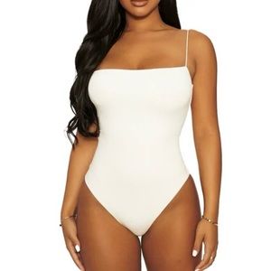 NWOT Naked Wardrobe cream/off white body suit